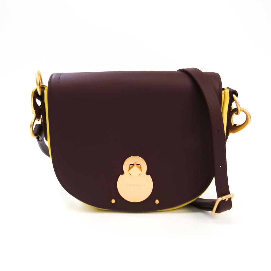 Authentic Longchamp CAVALCADE WILD 1395 HNB F10 Women's: This item qualifies for FREE DOMESTIC SHIPPING to customers in the USA Brand: Longchamp Model: CAVALCADE WILD 1395 HNB F10 Type: Shoulder bag Material: Leather ,Suede Color: Bordeaux, Yellow Size (HxW