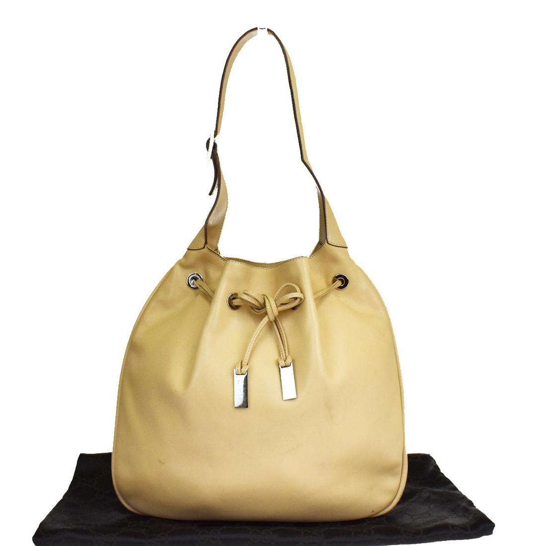 Authentic Gucci Leather Shoulder Bag Beige: This item qualifies for FREE DOMESTIC SHIPPING to customers in the USA Brand: Gucci Type: Shoulder bag Material: Leather Color: Beige Size (HxWxD): 29cm x 31cm x 2cm / 11.41'' x 12.2'' x 0.78'' Serial