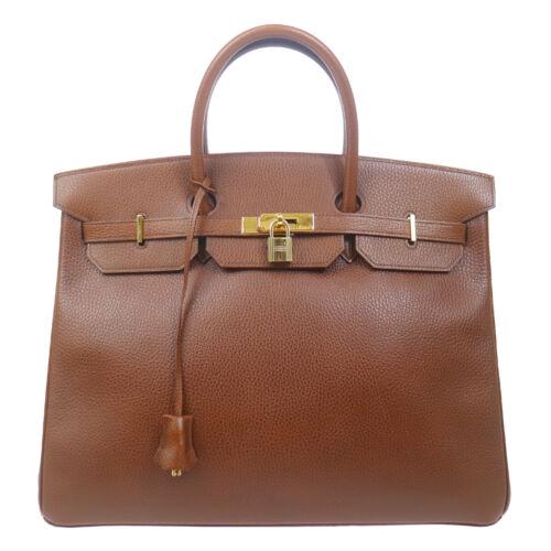 Authentic HERMES BIRKIN 40 Hand Bag: This item qualifies for FREE DOMESTIC SHIPPING to customers in the USA Size: Large Color: Marron fonce Model: HERMÃƒË†S Birkin 40 Year Manufactured: 1990-1999 Country/Region of Manufacture: Franc