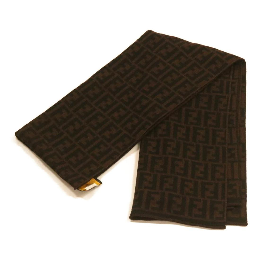 Authentic FENDI Zucca Scarf Dark Brown: This item qualifies for FREE DOMESTIC SHIPPING to customers in the USA Brand: FENDI Style: Scarf Material: Wool Color: Dark Brown Made In: Italy Size (Inches): W68.9 x H15.7inch(Approx) Exterior Condi