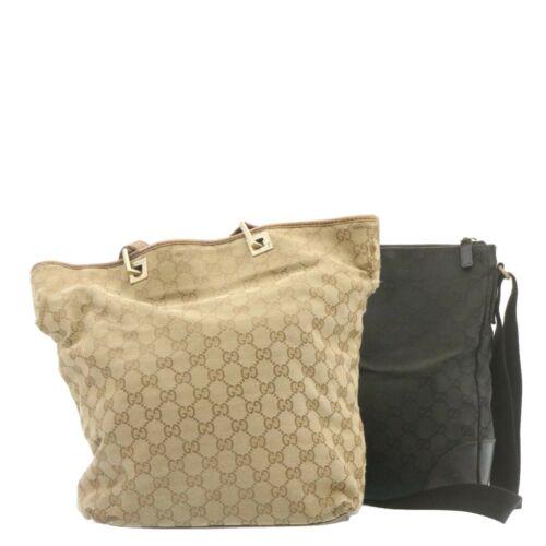Authentic GUCCI GG Canvas Tote Shoulder Bag 2Set Black: This item qualifies for FREE DOMESTIC SHIPPING to customers in the USA Brand: GUCCI Style: Shoulder Bag Material: GG Canvas Color: Black\n / Beige Department: Women Country of Manufacture: Italy Type: