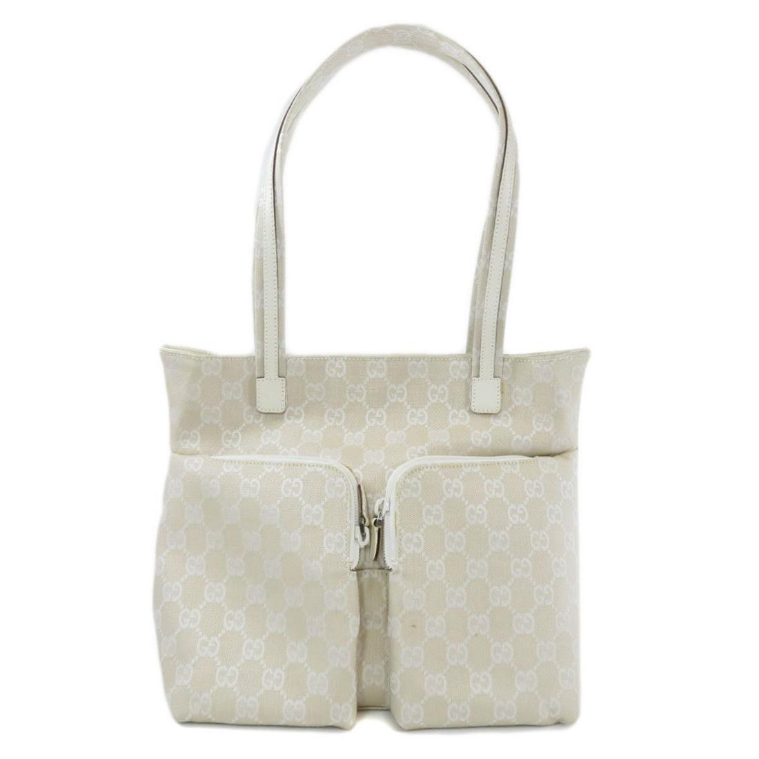 Authentic Gucci 2684 GG Tote Bag Canvas Ladies: This item qualifies for FREE DOMESTIC SHIPPING to customers in the USA Brand: Gucci Type: Tote bag Gender: Women Condition: Used (very good) Color: White Material: Canvas Damage Ranking: Overall ,Stai