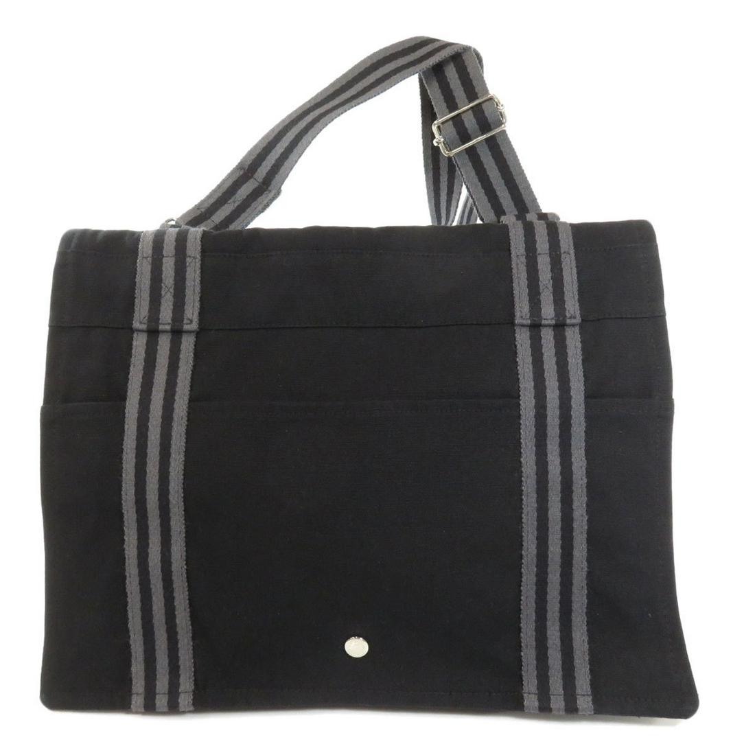 Authentic Hermes Fool Tubasas Tote Bag Canvas Ladies: This item qualifies for FREE DOMESTIC SHIPPING to customers in the USA Brand: Hermes Type: Tote bag Gender: Women Accessories: None Condition: Used (very good) Model: Fool to Basas Color: Black Materi