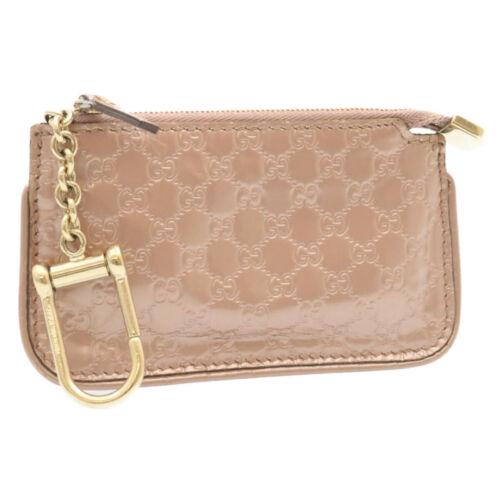 Authentic GUCCI Micro GG Canvas Coin Purse Pink: This item qualifies for FREE DOMESTIC SHIPPING to customers in the USA Brand: GUCCI Style: Coin Purse Material: Enamel Color: Pink Size: See Description Bag Height: 3.0inch(Approx) / 7.5cm(Approx) Bag
