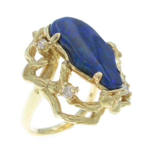 Authentic K18 Yellow Gold Black Opal ring: This item qualifies for FREE DOMESTIC SHIPPING to customers in the USA Material: K18YG Gender: Ladies Size: 12.0 (JPN size) Stone: Diamond 0.186ct ActualSize: Width: : 22.7mm CenterStone: Black Opal 2