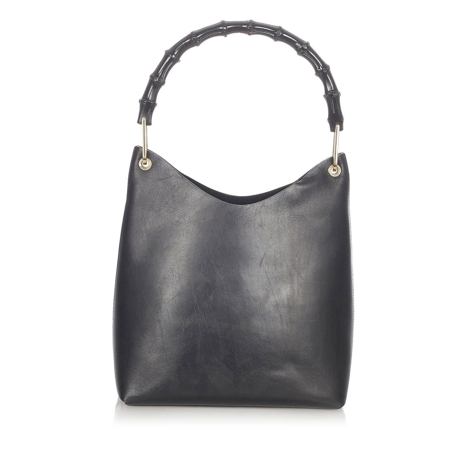 Gucci Bamboo Leather Handbag: Gucci Bamboo Leather Handbag This handbag features a leather body a bamboo top handle an open top and an interior zip pouch. Brand: Gucci Model: Bamboo Leather Handbag Origin: Italy Category: Bags Col