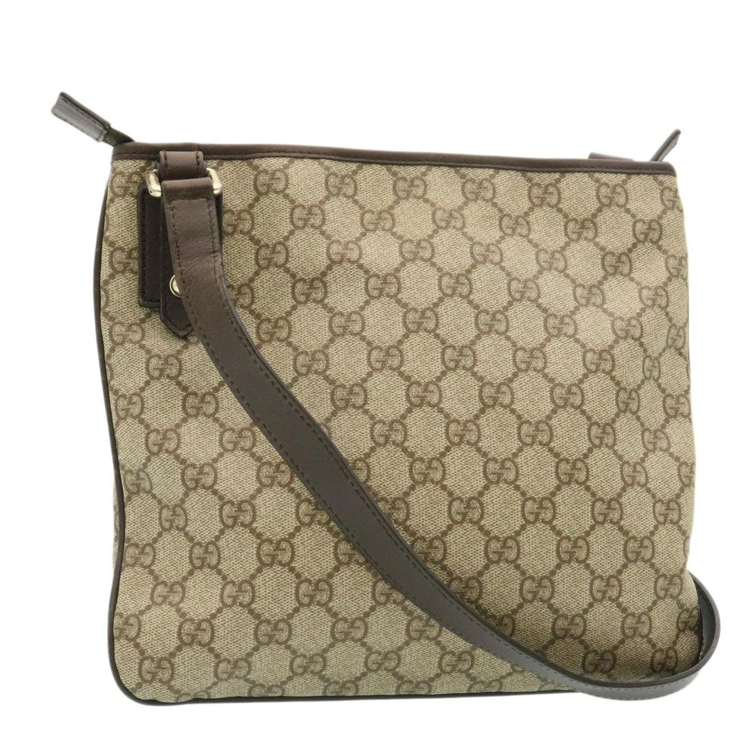 GUCCI GG Canvas Shoulder Bag outlet Brown: GUCCI GG Canvas Shoulder Bag outlet Brown Brand: GUCCI Style: Shoulder Bag Material: Coated Canvas / GG Canvas Color: Brown Made In: Italy Size (Inches): W10.2 x H9.4 x D0.8inch(Approx) / Shoulder Dro