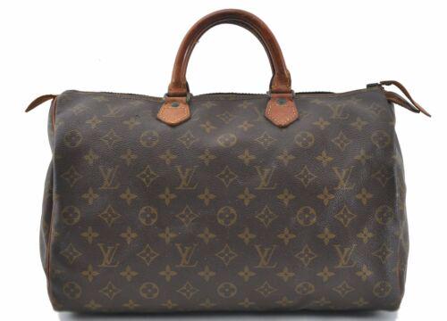 Louis Vuitton Monogram Speedy 35 Hand Bag Old Model LV: Louis Vuitton Monogram Speedy 35 Hand Bag Old Model LV Brand: Louis Vuitton Country/Region of Manufacture: ****** Bag Length: 14inches(35cm) Bag Height: 9inches(23cm) Bag Depth: 7.5inches(19cm) Handle