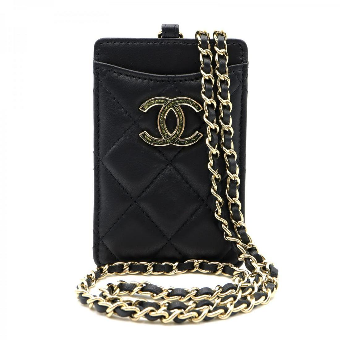 CHANEL Card Case with Chain(Black): CHANEL Card Case with Chain(Black) Brand: CHANEL Model: CHANEL Card Case with Chain(Black) Category: Women:Small Items Color: Black Dimensions: The Mynt Guarantee: All items in this auction are guaran