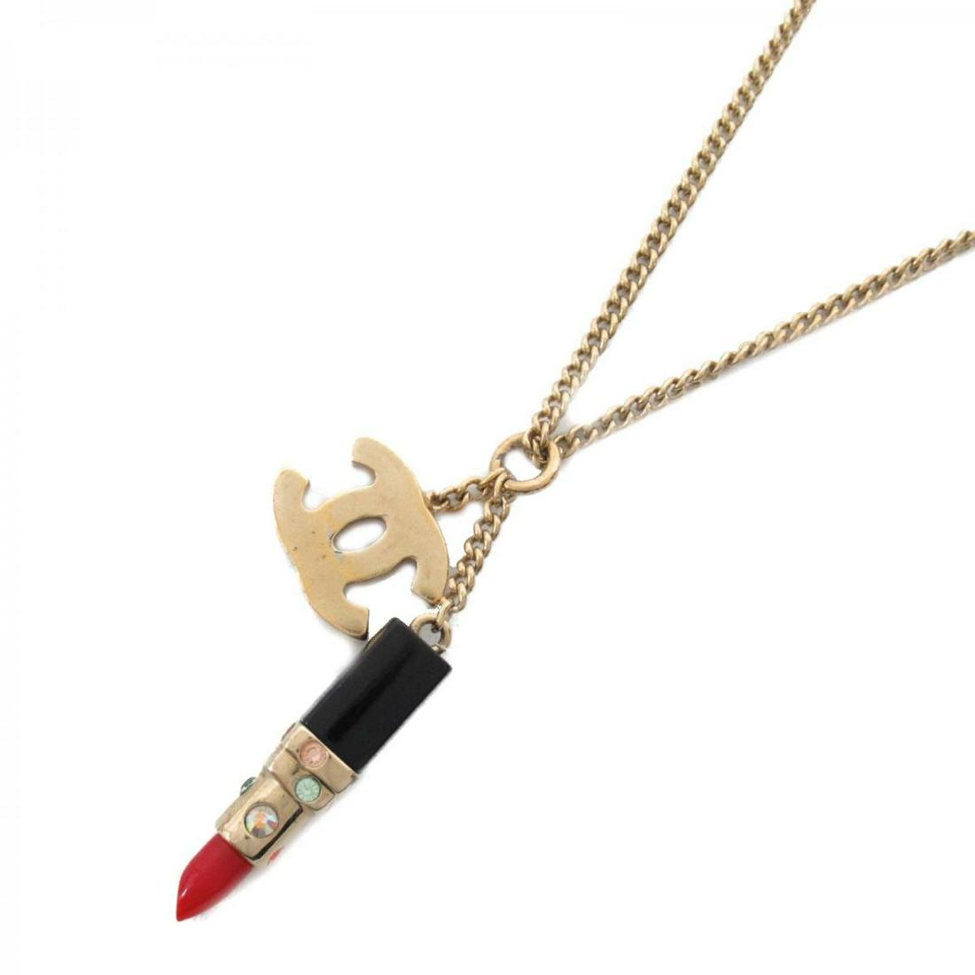 CHANEL COCO MarkNecklace(Gold): CHANEL COCO MarkNecklace(Gold) Brand: CHANEL Model: CHANEL COCO MarkNecklace(Gold) Category: Women:Accessories Color: Gold Dimensions: The Mynt Guarantee: All items in this auction are guaranteed auth