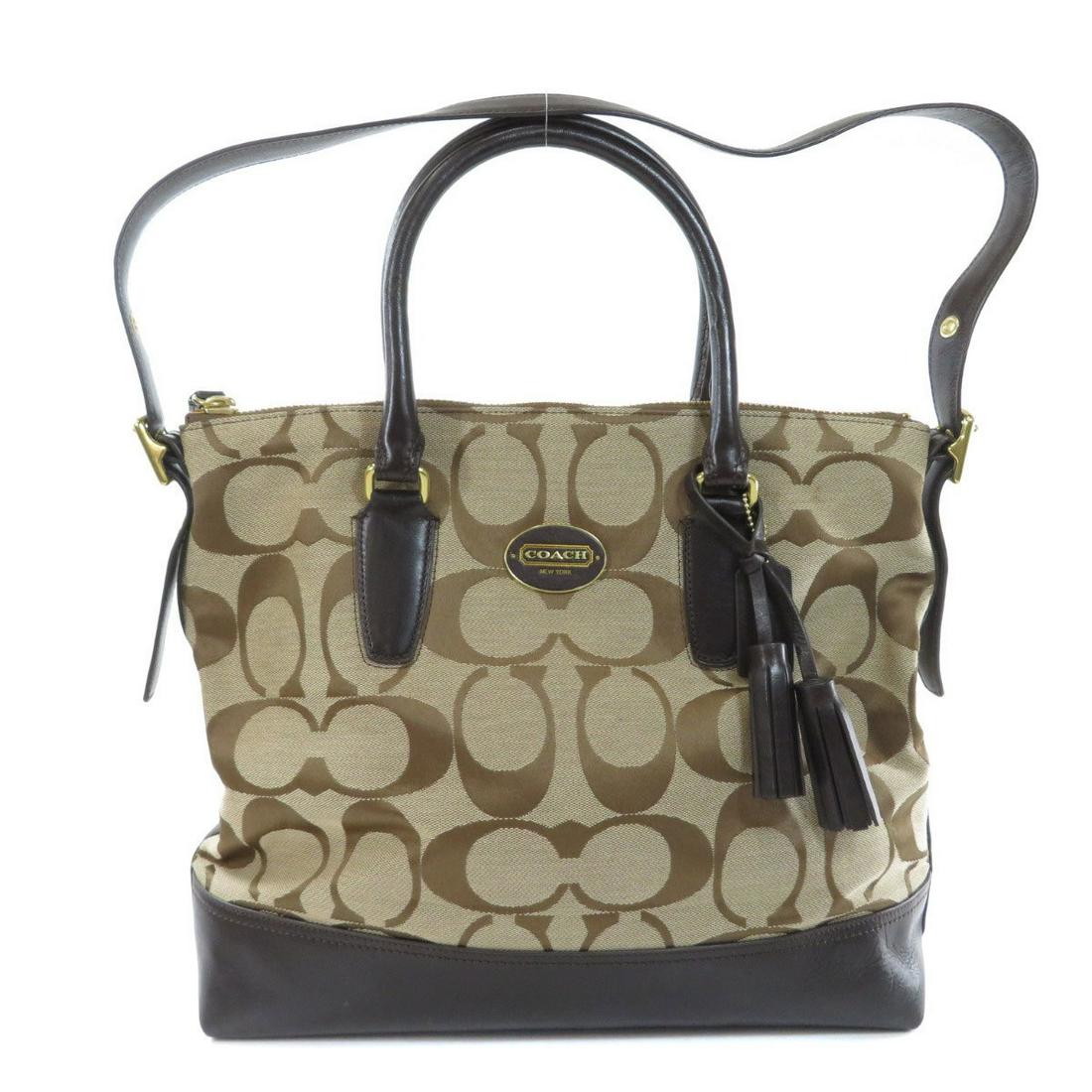 Coach 21147 Signature 2WAY Tote Bag Canvas Ladies: Coach 21147 Signature 2WAY Tote Bag Canvas LadiesBrand: Coach Type: Tote bag Condition: Used (very good) Material: Canvas Color: Brown Size (HxWxD): 32cm x 36cm x 13cm / 12.59'' x 14.17'' x 5.11'' Han
