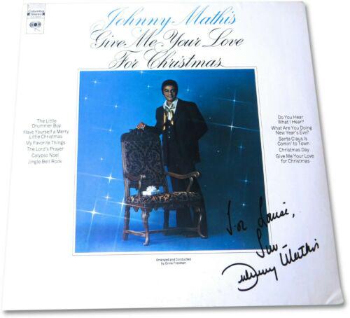 Johnny Mathis Signed Autographed Album Cover Give Me: Johnny Mathis Signed Autographed Album Cover Give Me Love for X-Mas JSA Industry: Music Autograph Authentication: James Spence (JSA) Object Type: Record Player: Johnny Mathis Original/Reproduction: Or