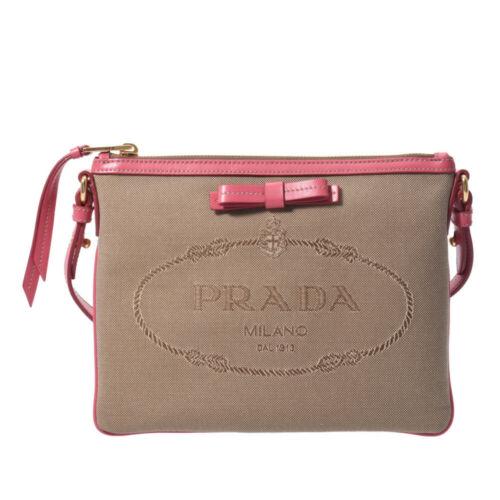PRADA Logo jacquard Beige x pink 1BH150 Bag: PRADA Logo jacquard Beige x pink 1BH150 Bag Brand: PRADA Style: Bag Material: Jacquard canvas Color: Pink Size: See Description Bag Height: 18cm Bag Length: 24cm Department: Ladies Type: Shoulder Bag 