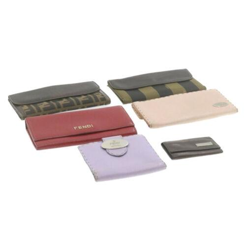 FENDI Leather Wallet Keycase 7set Red Black: FENDI Leather Wallet Keycase 7set Red Black Brand: FENDI Type: unknown Color: Black Material: Leather Country/Region of Manufacture: Italy Department: Woman EAN: Does not apply The Mynt Guarantee: All