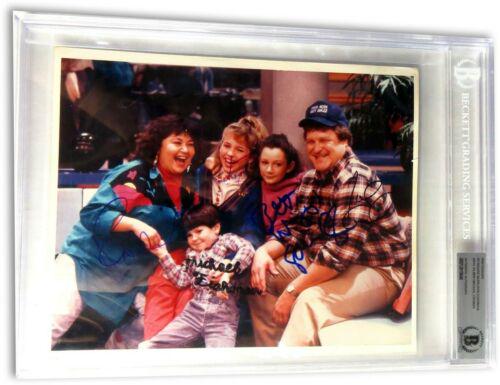 Roseanne Cast Signed Autographed Photo Barr John: Roseanne Cast Signed Autographed Photo Barr John Goodman Gilbert BGS Object Type: Photograph Industry: Television Original/Reproduction: Original Signed by: Roseanne BarrJohn Goodman Autograph Authent