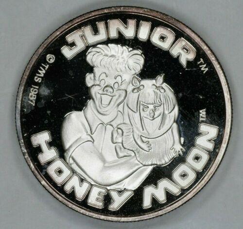 VINTAGE SILVER BAR ESTATE 1 TR OZ .999 CARTOON: VINTAGE SILVER BAR ESTATE 1 TR OZ .999 CARTOON CELEBRITIES JUNIOR HONEY Shape: Round Country/Region of Manufacture: United States Fineness: 0.999 Total Precious Metal Content: 1 Troy Ounce The MYNT Gu