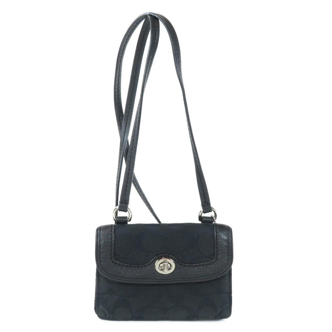 Coach Signature Mini Wallet Shoulder Bag Canvas Ladies: Coach Signature Mini Wallet Shoulder Bag Canvas LadiesBrand: Coach Line: Signature Type: Shoulder bag Gender: Women Condition: Used (very good) Material: Canvas Color: Black Size (HxWxD): 11cm x 15.5c