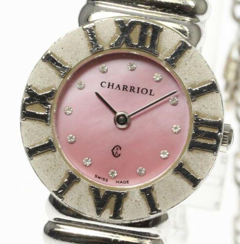 Philippe Charriol Saint-Tropez 6009908 Quartz Pink: Philippe Charriol Saint-Tropez 6009908 Quartz Pink Shell Dial Ladies Watch Brand: Philippe Charriol Type: Wristwatch Department: Womens The Mynt Guarantee: All items in this auction are guaranteed aut