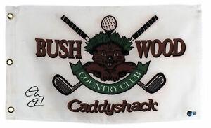 Chevy Chase Caddyshack Signed Bushwood Country Club Pin: Chevy Chase Caddyshack Signed Bushwood Country Club Pin Flag BAS Industry: Movies Original/Reproduction: Original Autograph Authentication: Beckett PRODUCT_COA: Beckett PRODUCT_SIGNED_BY_NAME: Chevy C