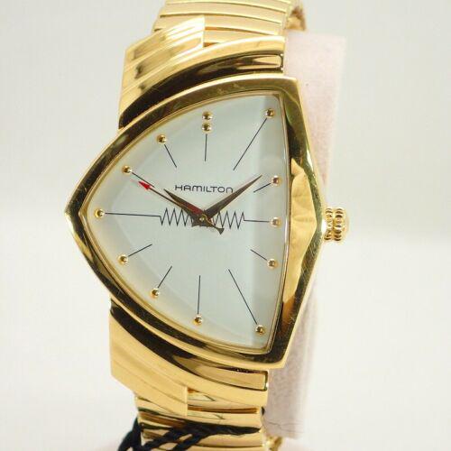 Hamilton Ventura H243010 GP Gold Flex Belt Quartz White: Hamilton Ventura H243010 GP Gold Flex Belt Quartz White Dial Men's Watch Brand: Hamilton Type: Wristwatch Department: Mens The Mynt Guarantee: All items in this auction are guaranteed authentic and co