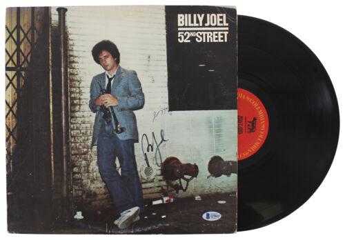 Billy Joel Signed 52nd Street Album Cover W/ Vinyl BAS: Billy Joel Signed 52nd Street Album Cover W/ Vinyl BAS Industry: Music Object Type: Record Original/Reproduction: Original Autograph Authentication: Beckett PRODUCT_COA: Beckett PRODUCT_SIGNED_BY_NAME