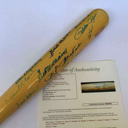 Ted Williams Hank Aaron Sandy Koufax Ernie Banks HOF: Ted Williams Hank Aaron Sandy Koufax Ernie Banks HOF Signed Bat 30+ Sigs Player: Ted Williams Sport: Baseball-MLB Original/Reprint: Original Autograph Authentication: James Spence (JSA) Product: Bat P