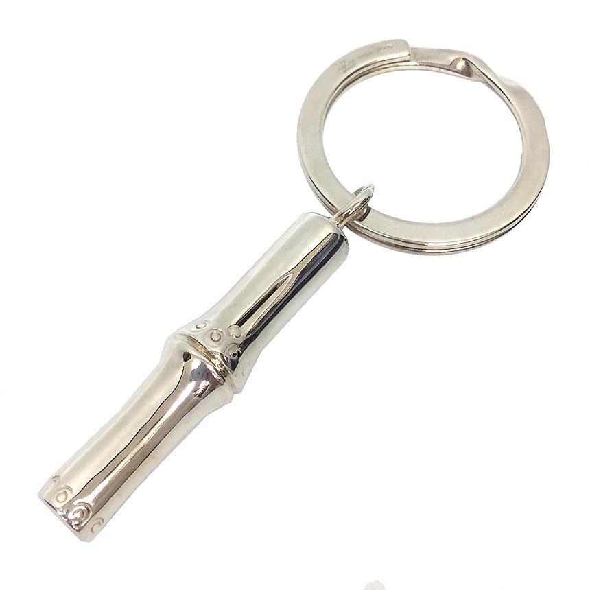 Gucci Bamboo Keychain Keyring Key Charm Bag Silver 925: Gucci Bamboo Keychain Keyring Key Charm Bag Silver 925Brand: Gucci Type: Keyring Material: Silver 925 Color: Silver Condition: Used (like new) The Mynt Guarantee: All items in this auction are guarant