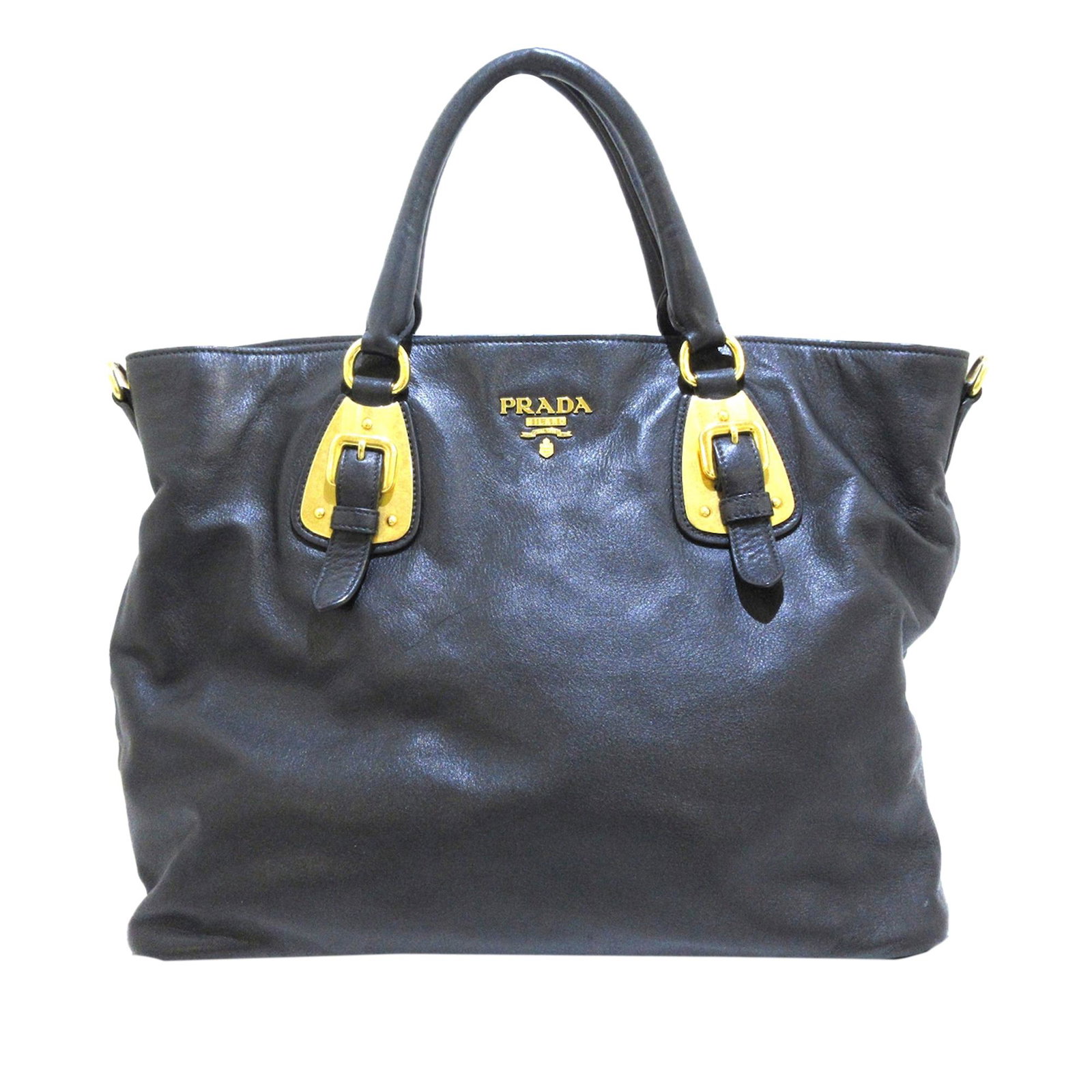 Prada Vitello Daino Leather Satchel: Prada Vitello Daino Leather Satchel This satchel features a leather body rolled leather handles a detachable flat leather strap an open top with snap button closure and interior zip and slip pockets. 