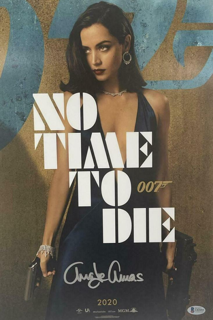 Ana de Armas Authentic Autographed 12x18 Photo Poster: Ana de Armas Authentic Autographed 12x18 Photo Poster Signature: Ana de Armas Product: Autographed 12x18 Photo Poster Featured Movie: James Bond: No Time To Die Certificate of Authenticity: Beckett Ho