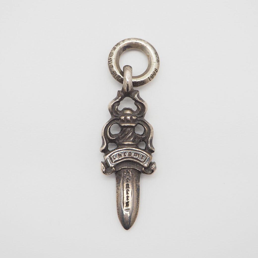 Chrome Hearts Dagger Charm # 5 Silver: Chrome Hearts Dagger Charm # 5 Silver Brand: Chrome Hearts Material: Silver 925 Color: Silver Condition: Used (good) Damage Ranking: Overall, Discoloration, - Overall Scratches: Moderate Overall Dirt: