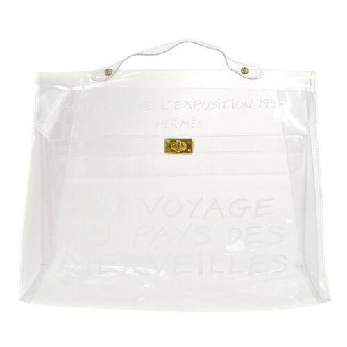 HERMES Vinyl Kelly Beach Hand Bag Purse SOUVENIR DE: HERMES Vinyl Kelly Beach Hand Bag Purse SOUVENIR DE L'EXPOSITION 1997 Size: Medium Accents: Logo Model: Vinyl Kelly Department: Women Style: Hand Bag Bag Height: 12.2 Product Line: HERMES Vinyl Materi