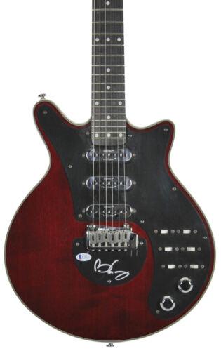 Brian May Queen Signed Red Wood Grain Guitar Autographed BAS: Brian May Queen Signed Red Wood Grain Guitar Autographed BAS Industry: Music Object Type: Guitar & Guitar Pick Original/Reproduction: Original Autograph Authentication: BAS PRODUCT_COA: BAS PRODUCT_SI