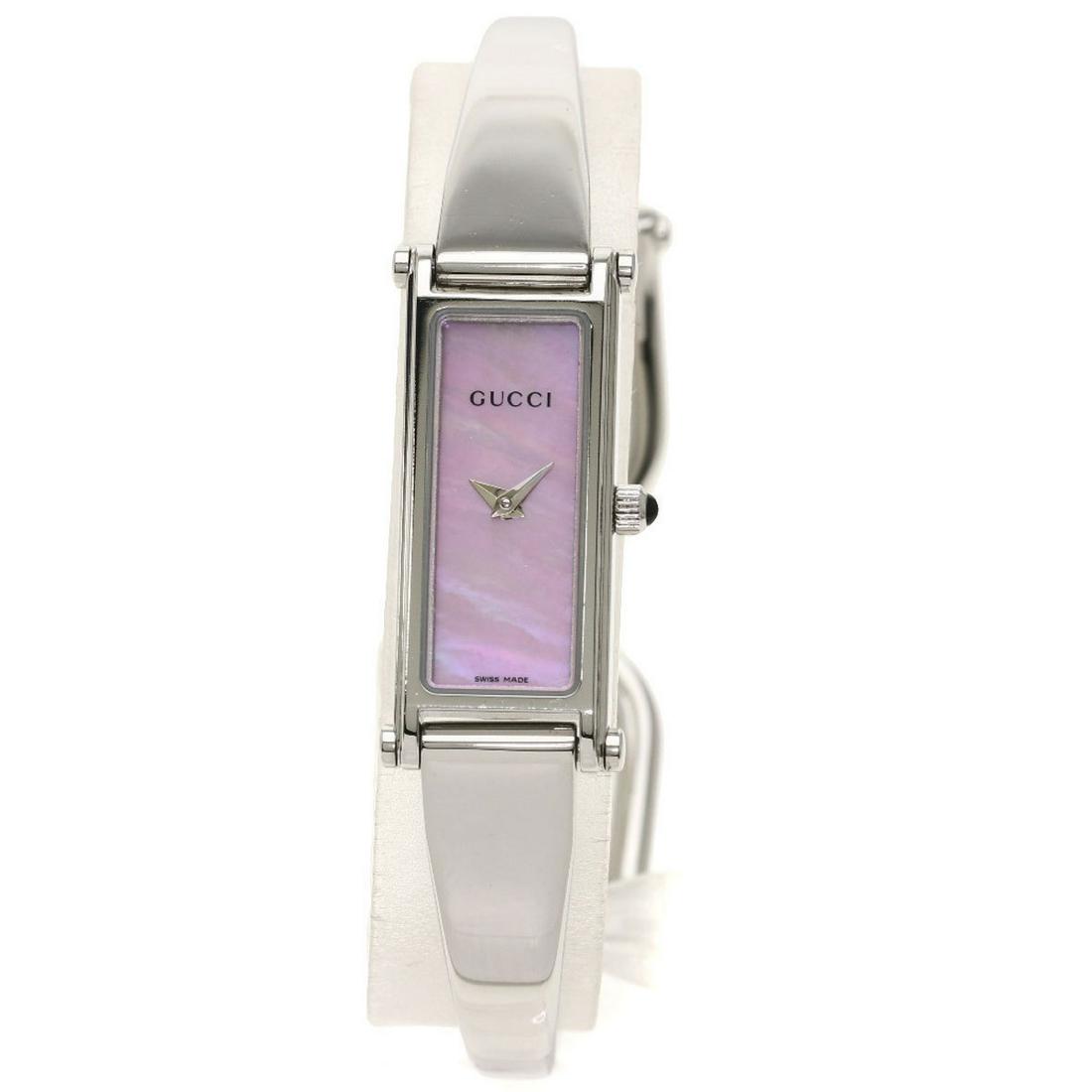 Gucci 1500L Square Face Watch Stainless Steel Ladies: Gucci 1500L Square Face Watch Stainless Steel LadiesBrand: Gucci Condition: Used (very good) Gender: Women Material (Case): Stainless steel Material (Band): Stainless steel Color (Dial): Pink shell Mo
