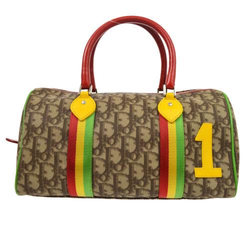 Christian Dior Trotter Hand Bag 05-MA-0054 Purse Brown PVC Rasta-Color: Christian Dior Trotter Hand Bag 05-MA-0054 Purse Brown PVC Rasta-Color Size: Medium Accents: Logo Model: Hand Bag Country/Region of Manufacture: Italy Department: Women Style: Hand Bag Handle Style: D