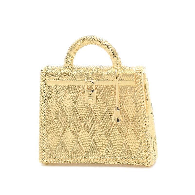 Hermes Curiosite Kelly Charm Pendant Top Metal Gold: Hermes Curiosite Kelly Charm Pendant Top Metal Gold Brand: Hermes Line: Kelly Material: Metal Color: Gold Weight: 30g / 1.05oz. Pendant Size: 30mm x 27mm / 1.18 x 1.06 The Mynt Guarantee: All items in