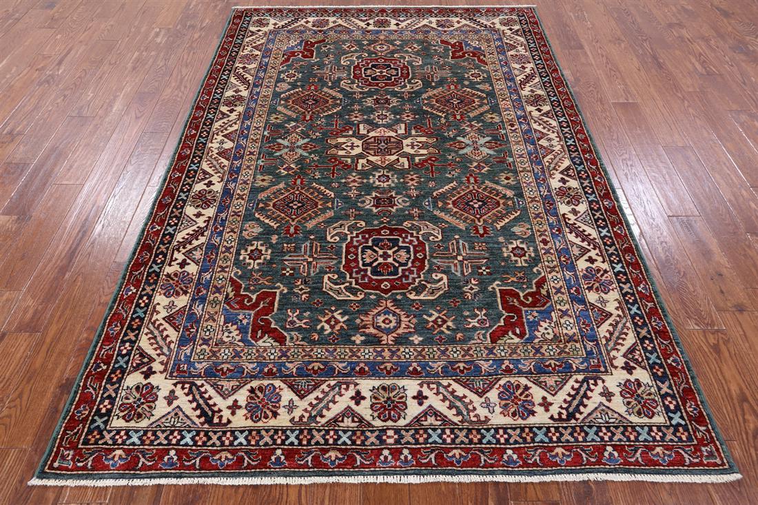 Super Kazak Hand-Knotted Wool Rug 6' 0" X 8' 7": Super Kazak Hand-Knotted Wool Rug 6' 0" X 8' 7" Design: Traditional Exact Size: 6\ 0 X 8\ 7 Style: Super Kazak Foundation: Cotton Pile: Wool Weave: Hand-knotted Age: New The Mynt Guarantee: All items