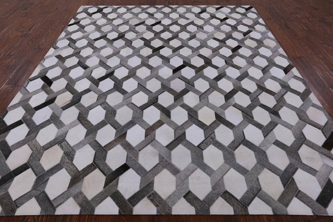 Natural Cowhide Hand Stitched Rug 8' 0" X 10' 0": Natural Cowhide Hand Stitched Rug 8' 0" X 10' 0" Material: Organic Natural Cowhide Exact Size: 8\ 0 X 10\ 0 Age: New The Mynt Guarantee: All items in this auction are guaranteed authentic and come wit