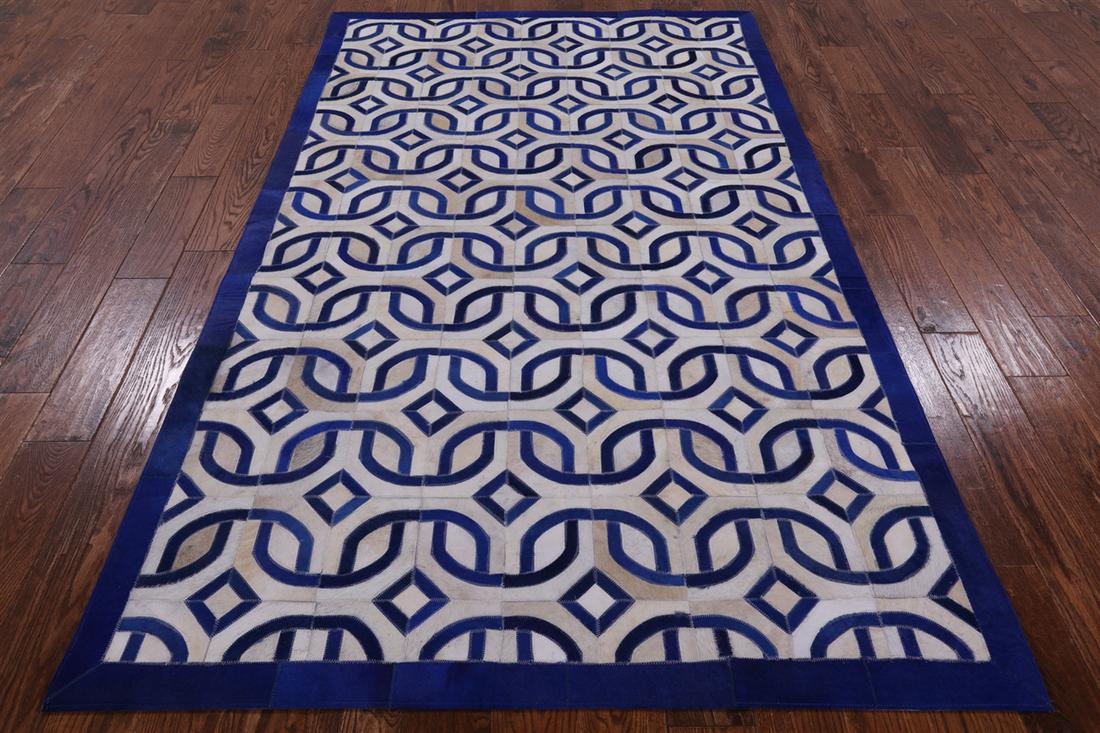 5' 0" X 8' 0" Cowhide Hand Stitched Area Rug: 5' 0" X 8' 0" Cowhide Hand Stitched Area Rug Material: Organic Natural Cowhide Exact Size: 5\ 0 X 8\ 0 Age: New The Mynt Guarantee: All items in this auction are guaranteed authentic and come with a 1