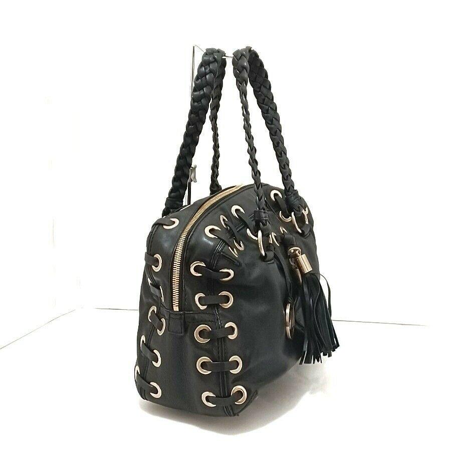 MICHAEL KORS Black Gold Leather & Hardware: MICHAEL KORS Black Gold Leather & Hardware Brand: MICHAEL KORS Style: Handbag Exterior Color: Black Gold Exterior Material: Leather & Hardware Accessories: Charm Department: Women Type: Handbag B: Rea