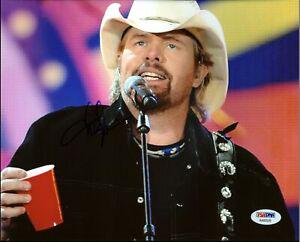 Toby Keith Country Musician Signed 8X10 Photo PSA/DNA: Toby Keith Country Musician Signed 8X10 Photo PSA/DNA Industry: Music Object Type: Photograph Original/Reproduction: Original Autograph Authentication: PSA/DNA PRODUCT_COA: PSA/DNA