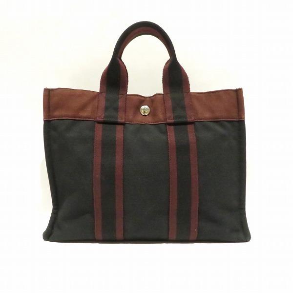 Hermes Fool Toe PM Canvas Black x Red Bag Handbag Unisex: Hermes Fool Toe PM Canvas Black x Red Bag Handbag Unisex Brand: Hermes Line: Fourre Tout Type: Handbag Gender: Unisex Material: Cotton Cotton: Color: Black Red color Size (HxWxD): 23cm x 30cm x 8cm /