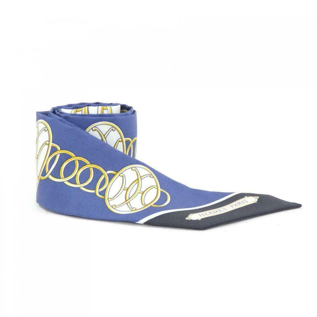 HERMES Twilly 063777S Scarf: HERMES Twilly 063777S Scarf Brand: HERMES Style: Scarf Color: MARINE+BLACK+GOLD Material: silk Gender: Unisex Size: W x H 86cmx5cm Type: Scarf A: Excellent The Mynt Guarantee: All items in this auctio