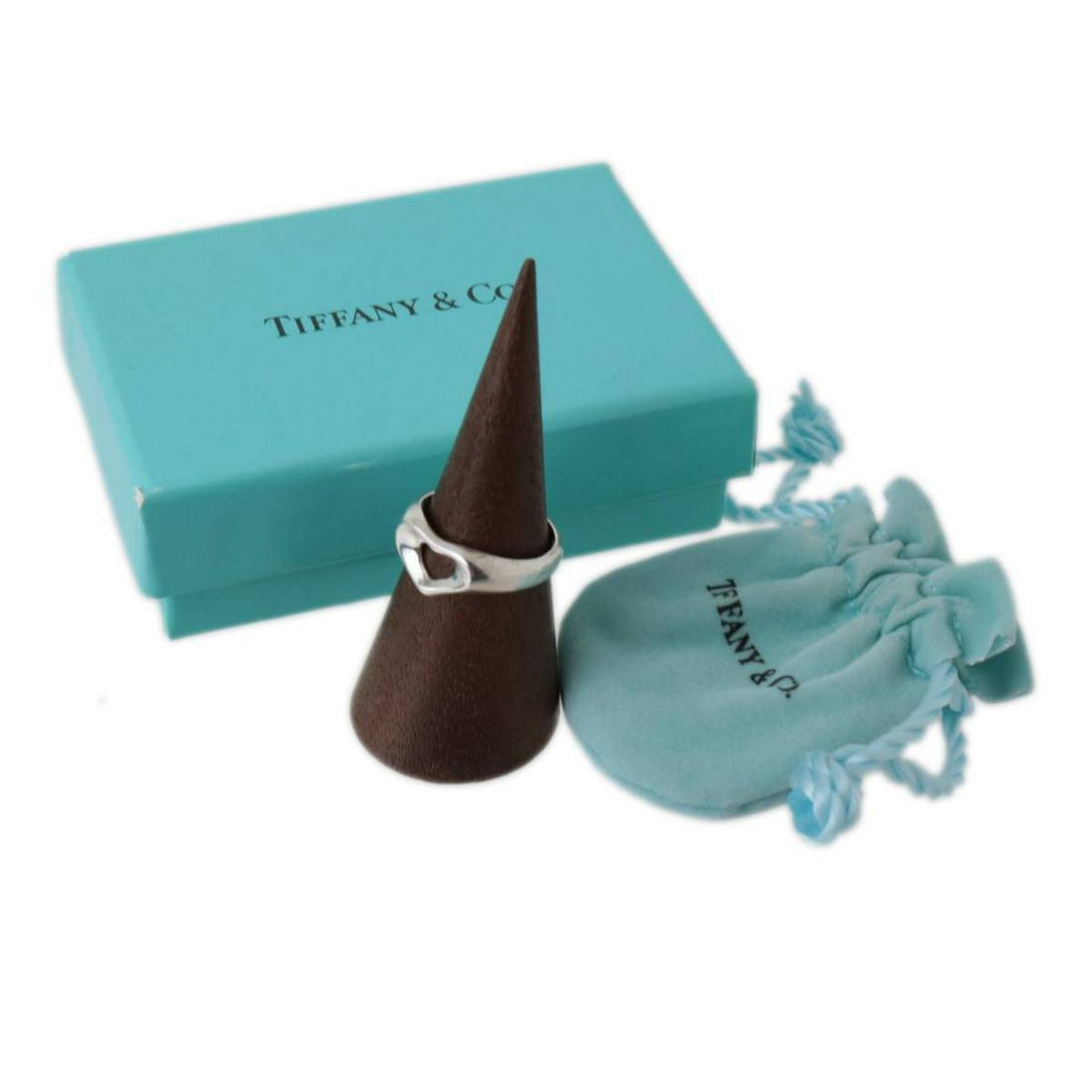 Tiffany & Co. / Elsa Peretti Open Heart Ring SV925 Silver No. 11: Tiffany & Co. / Elsa Peretti Open Heart Ring SV925 Silver No. 11 Brand: Tiffany Line: Open Heart Material: Silver 925 US Size: 6 Width: 8.4mm / 0.33 Weight: 3.3g / 0.11oz. Overall Scratches: Slight Ov