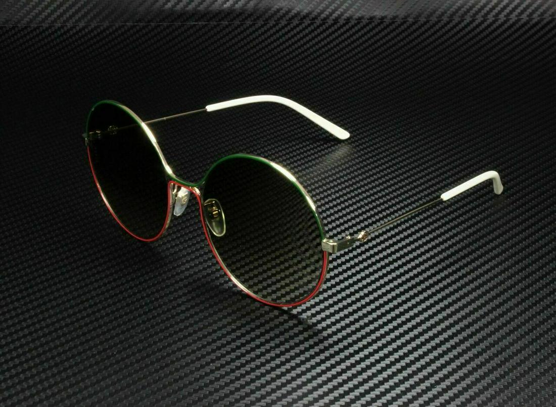 GUCCI GG0395S 003 Round Oval Gold Ivory Gold Brown 58 mm Women's: GUCCI GG0395S 003 Round Oval Gold Ivory Gold Brown 58 mm Women's Brand: Gucci Department: Women Frame Color: Brown Style: Oval Type: Sunglasses New The Mynt Guarantee: All items in this auction are gu