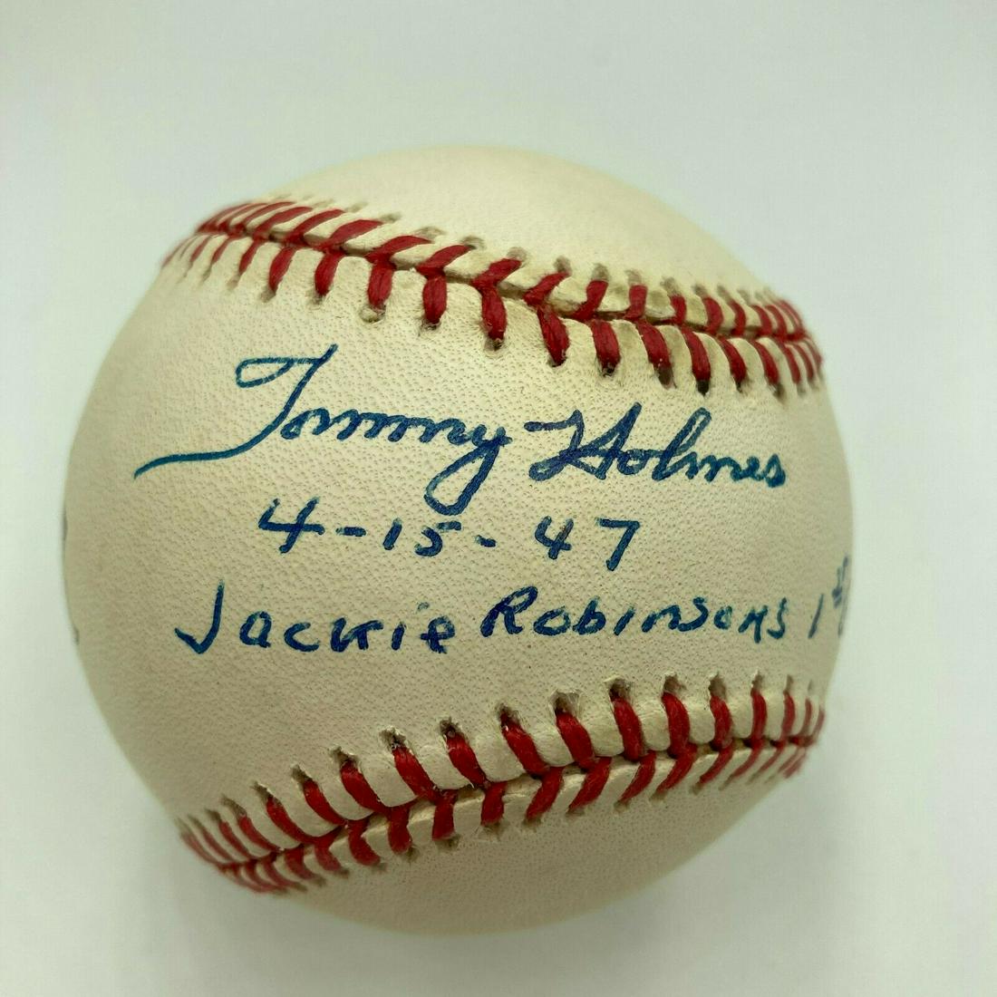Tommy Holmes "April 15 1947 Jackie Robinson First Game" Signed Baseball JSA: Tommy Holmes "April 15 1947 Jackie Robinson First Game" Signed Baseball JSA Product: Ball Sport: Baseball-MLB Autograph Authentication: James Spence (JSA) Original/Reprint: Original Pre-Owned PLEASE N