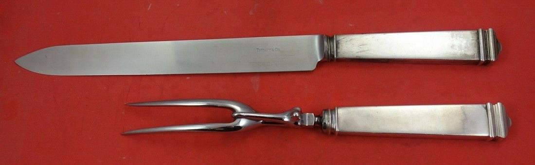 Hampton by Tiffany and Co Sterling Silver Roast Carving Set 2-pc 13 3/4": Hampton by Tiffany and Co Sterling Silver Roast Carving Set 2-pc 13 3/4" Maker: Tiffany & Co. Featured Refinements: Tiffany Sterling Silverware Composition: Sterling Silver Age: 1900-1940 Brand: Tiffa