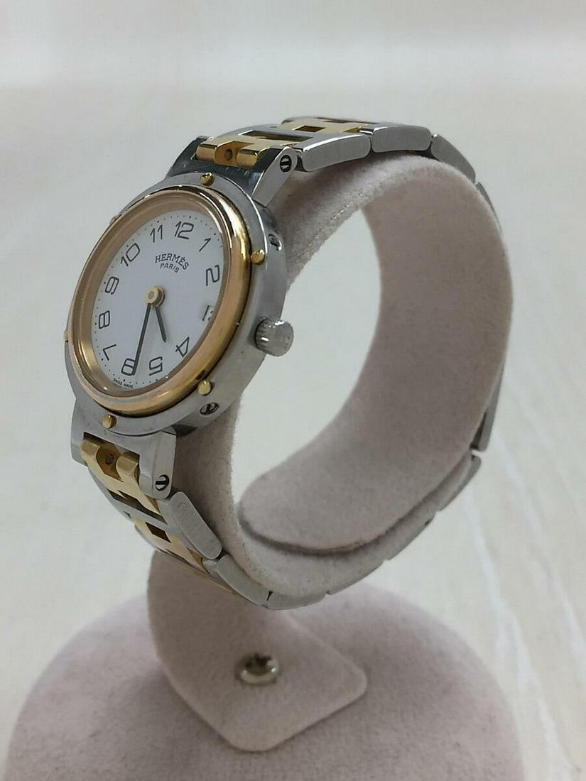 HERMES Clipper Combination 1st Initial Quartz Analog Stainless Ladies: HERMES Clipper Combination 1st Initial Quartz Analog Stainless Ladies Brand: Hermes Type: Wristwatch Pre-Owned The BIDHAUS Guarantee: All items in this auction are guaranteed authentic and come with a