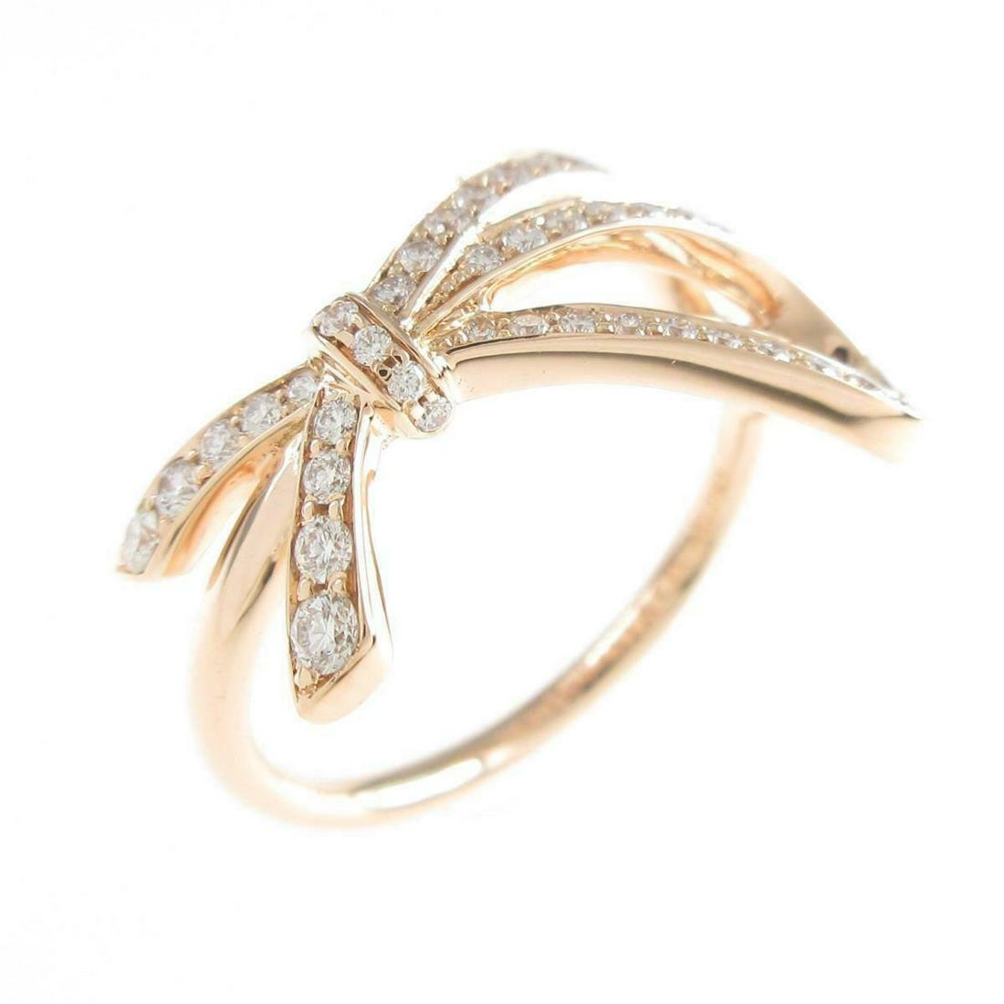 TIFFANY Bow Ring: TIFFANY Bow Ring Brand: TIFFANY Material: 750PG Gender: Ladies Size: 6.5 (JPN size) Actualsize: W : 11.7mm Centerstone: Diamond AB: Very Good The Mynt Guarantee: All items in this auction are guarante