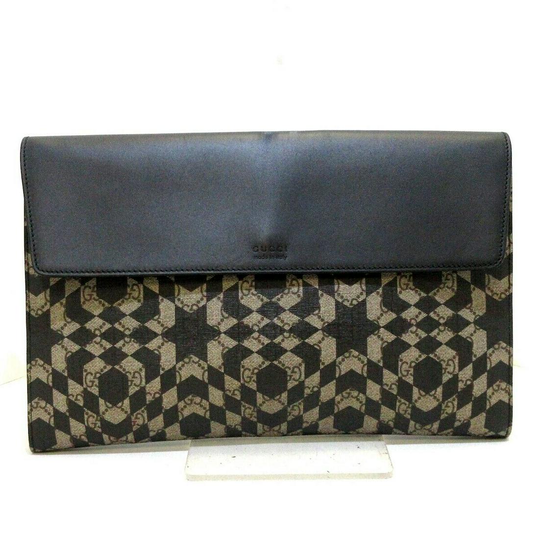 GUCCI GG Kaleido Supreme Canvas Portfolio Black PVC Clutch: GUCCI GG Kaleido Supreme Canvas Portfolio Black PVC Clutch Brand: GUCCI Style: Clutch Bag Exterior Color: Black Light Brown Dark Brown Exterior Material: PVC Leather Model Number: 406725 Product Name: