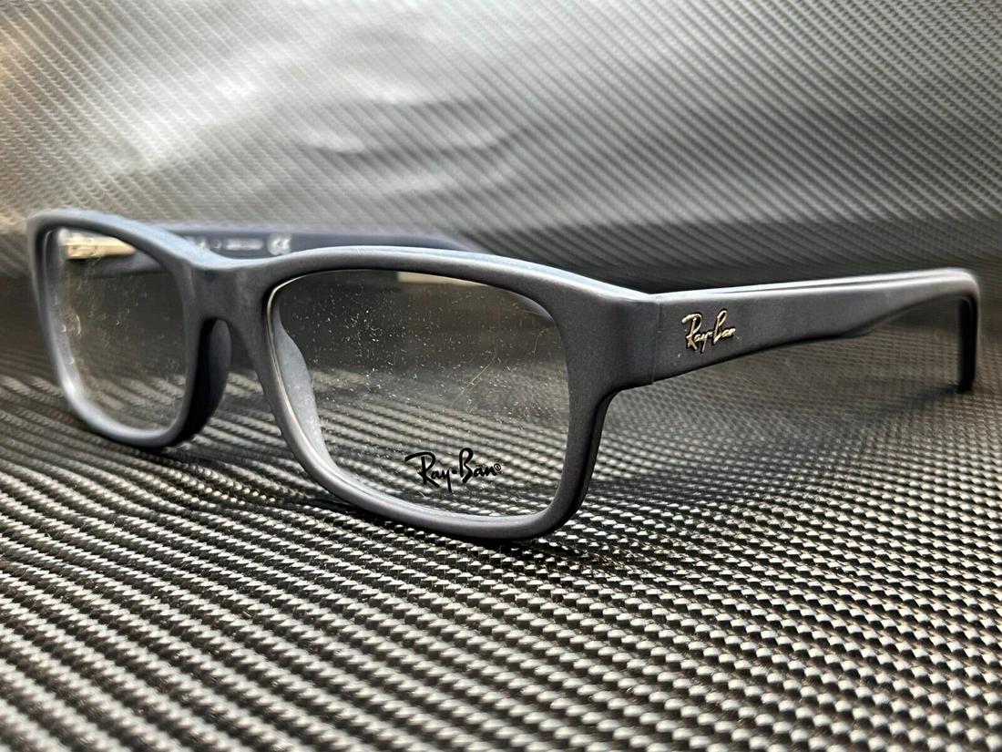 RAY BAN RX5268 5583 Sand Blue Rectangle 50 mm Unisex Eyeglasses: RAY BAN RX5268 5583 Sand Blue Rectangle 50 mm Unisex Eyeglasses Style: Rectangle Type: Eyeglasses Brand: Ray Ban Frame Color: Blue New The Mynt Guarantee: All items in this auction are guaranteed auth
